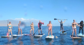 Spend at least two hours per day with physical, mental, spiritual or social activities (here Stand-up Paddling in Hawaii)